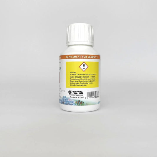 Triton supplement for seawater aquarium, 100ml bottle with warning label, plain background